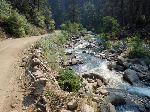 GDMBR: It is always pleasant and serene to ride parallel to a mountian river.